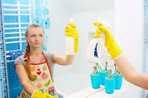 Cleaner inspecting a workspace for hazards before starting a cleaning task